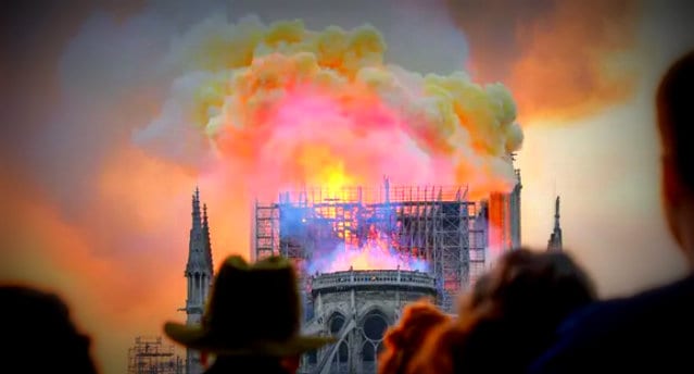 notre dame burning arson vandalism attack christian heritage assault getty herland report